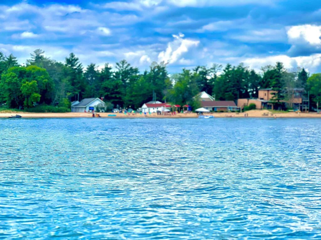 View of Sandy Shores Cottages vacation rentals in Michigan from the water